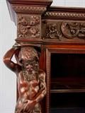 100 - Mahogany R.J. Horner 3 Door Bookcase with atlas statue sides, curved glass on center door, 60 in. T, 84 in. L, 20 in. D, all original, ca. 1890. Close view of beautiful carving.