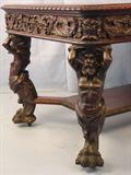 102d - R.J. Horner Mahogany Library Table w full body standing atlas legs, 60 in L, 36 in W, 30 in T, carved all around on 6 in. skirt, ca. 1890, all original. Close view of standing atlas.