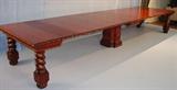 137 - Hugh Mahogany Banquet Table, twist corner legs, beautiful carving, giant center leg, 16ft. 1 in. L, 54in. W, has 11 leaves in original storage crate, ca 1890. View with added leaves.