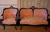 548 - Two Piece Mahogany Victorian Parlor Suit, love seat and chair, rose colored floral upholstery, mint condition, ca. 1880.