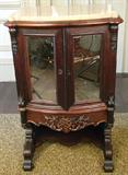 547 - Rosewood Rococo Music Cabinet with great carving and coral marble top, mirrored doors, 38 in. T, 16 in. D, 24 in. W, ca. 1850.