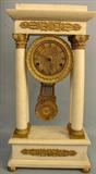 78 - Marble French Portico Clock with bronze mounts and pendulum, 19 in. T, 10 in. W, 5 in. D, ca. 1850.