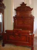120 - 4 pc. Mitchell & Rammelsberg Victorian Bedroom Suit, High back bed, Drop Center Dresser, 3 drawer washstand, massive wardrobe, original finish, ca. 1870. Bed, 8ft. 7in. T, 74in. L, 58in. W.