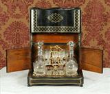 718 - Black Lacquer Box with string inlay - Tantalus Set with original bottles and glasses, ca. 1890.