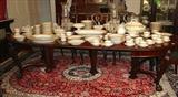 100 - Mahogany Dining Table with carved figural legs, 60 in. dia. with 6 twelve in. leaves, made by Robert Mitchell of N.Y., ca. 1895.