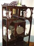 117 - Aesthetic Movement Mahogany Stick and Ball Etagere, ca. 1870, with beveled glass carved door