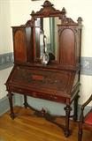 725 - Rosewood Victorian Slant Front Secretary Desk with mirror in center, 77in. T, 44in. W, 20in. D, ca. 1870.