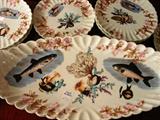 572 - Nine Piece Porcelain Fish Set with Blue and pink roses, tray 22in. L, 10in. W, ca. 1900.