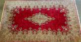 733 - Hand Made Wool Rug, 16ft. 2in. X 10ft. 2in.. Kirman, reds and gold's.