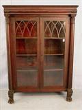 91 - Mahogany Empire China Cabinet with column front and claw feet, gadrooned edged top, 62in. T, 44in. W, 18in. D, ca. 1840.
