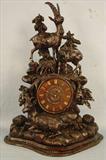 107 - Black Forrest Mantle Clock with mountain goats, 22in. T, 17in. W, 9 in. D, ca. 1880.