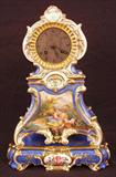 111 - Old Paris Mantle Clock on stand - hand painted, 12in. T, 8in. W, 5in. D, courting scene painted on front, blue and gold in color, ca. 1880.