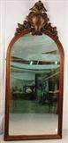519 - Walnut Victorian Hanging Mirror with great carved crest, 78in. T, 34in. W, ca. 1860.