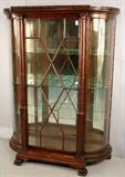 400 - R.J. Horner Large Oak Bow Glass china, column front, herringbone individual divided glass door, ca. 1890, 66in. T, 50in. W, 18in. D