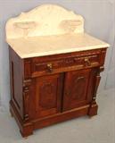 412 - High Style Renaissance Washstand, original marble top and backsplash, corbel column front, ca. 1870, 32in. W, 43in T, 18in. D.