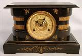 441 - American Renaissance Iron Black Mantle Clock, bronze ormolu, 10in. T, 15in. W, 7in. D, ca. 1880.