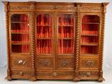 485 - Heavily Carved Oak 4 Door Bookcase, carved scenes of musician on plaques, grotesque faces, barley twist columns, ca. 1880, 7ft. T, 9ft. W, 18in. D, ca. 1860.