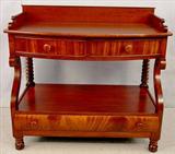 345 - Mahogany Empire Wash Stand with scroll column front, back splash, 33in. T, 35in. W, 20in. D, ca. 1880.