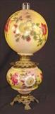 387 - Gone With The Wind Lamp, still oil, yellow with red roses, 22in. T, 9in. Dia.
