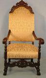 605 - Walnut Fireside Arm Chair with gold upholstery, 58in. T, 26in. W, 24in. D, ca. 1900.