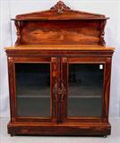 611 - Rosewood Rococo Parlor Cabinet with birdseye maple top, 56in. T, 42in. W, 20in. D, ca. 1850.