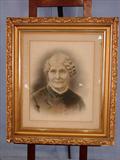 615 - Gold Leaf Victorian Frame with picture of lady in black Victorian dress, ca. 1900.