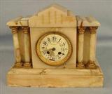 620 - Marble Mantle Clock with column front, 10in. T, 13in. W, 6in. D.