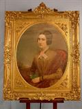 24 - Oil on Canvas of Victorian lady in very ornate gold frame, unsigned, framed size 49in. T, 39in. W, ca. 1870, from Atlanta estate.