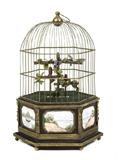 123 - Rare Automation Grass Bird Cage with 3 singing birds fitted with porcelain plaques, 21in. T, 14in. W.