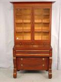 36 - Mahogany Empire Secretary Desk with scroll feet, lion head pulls, original glass, ca. 1840, 78in. T, 42in. W.