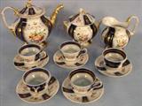 37 - 13 Piece Old Paris Tea Set, blue and gold, tea pot, creamer and sugar, ca. 1860.