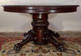 125 - Mahogany Empire dining Table with claw feet, acanthus carved base and gadrooned edge.