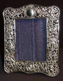 182 - Sterling Silver Victorian Picture Frame with figurals.