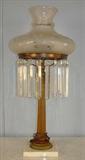 302 - Oversize Sonumbra Lamp with 8in. prisms and marble base, 31in. T, 13in. W, ca. 1870.