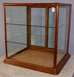 409 - Oak Counter Top Display Case, sliding doors, 27in. T, 24in. W, 21in. D, ca. 1900.