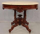 207 - American Oval Top Victorian Center Table, large size urn base, rosewood, Brooks look, 30in. T, 35in. W, 25in. D, ca. 1870.