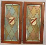 259 - Pair Stained Glass Doors windows, shield center, matched pair, 20in. W, 40in. T, ca. 1880, minor damage.
