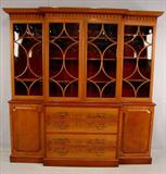 266 - Oversized Bubble Glass 3 Piece Breakfront, all in crotch mahogany, raised panel doors with gothic crest, ca. 1920, 82in. T, 82in. W, 20in. D.
