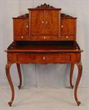 267 - Crotch Mahogany Ladies Secretary with enclosed top, pierced fretwork and carving's, ca. 1880, 42in. W, 59in. T, 28in. D.