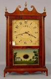 297 - Large Pillar and Scroll Mantle Clock, brass works clock, ca. 1890 with broken arch top and brass finials, hand painted looking glass, 30in x 17in.