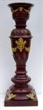 607 - Mahogany Pedestal with bronze trim and faces around center, 48in. T, 16in. W, 13in. at base.