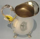 286 - Silver-plate, Water Pitchers with applied feet and ice guard