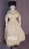 302 - 19.5in., China Head Doll with China legs & arms, cloth body and domestic cloth dress with crochet work