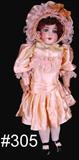 305 - 23in., Armand Marseille Bisque Doll with jointed composition body, open mouth, pink satin dress and black shoes