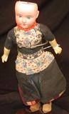 2501 - Schoenau & Hoffmeister, Bisque Head, Dutch Girl Doll with original clothes and wooden shoes (hair & eyes need repair)