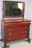147 - Flamed Mahogany, Empire Dresser with acanthus-carved pilasters, claw feet and mirror