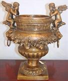 165 - Bronze Urn with pair of cupids, 12in. tall
