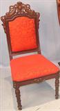 194 - Mahogany Parlor Chair with red upholstery and dolphins carved in crown