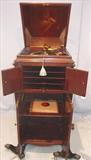 781 - Victor Victrola XVI Mahogany Phonograph with gold plating, records and pack of needles, 4-spring motor & reproducer cleaned and rebuilt, ca. 1914 (2)