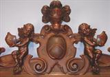 109 - 1911 Sideboard by Oriel Cabinet Co. that features massively carved mascarons, Norman soldiers, atlantes and caryatid figures as well as griffins in full relief (part of the "Norman Suite"), 95in. tall, 82in. wide, 28in. deep (crown)